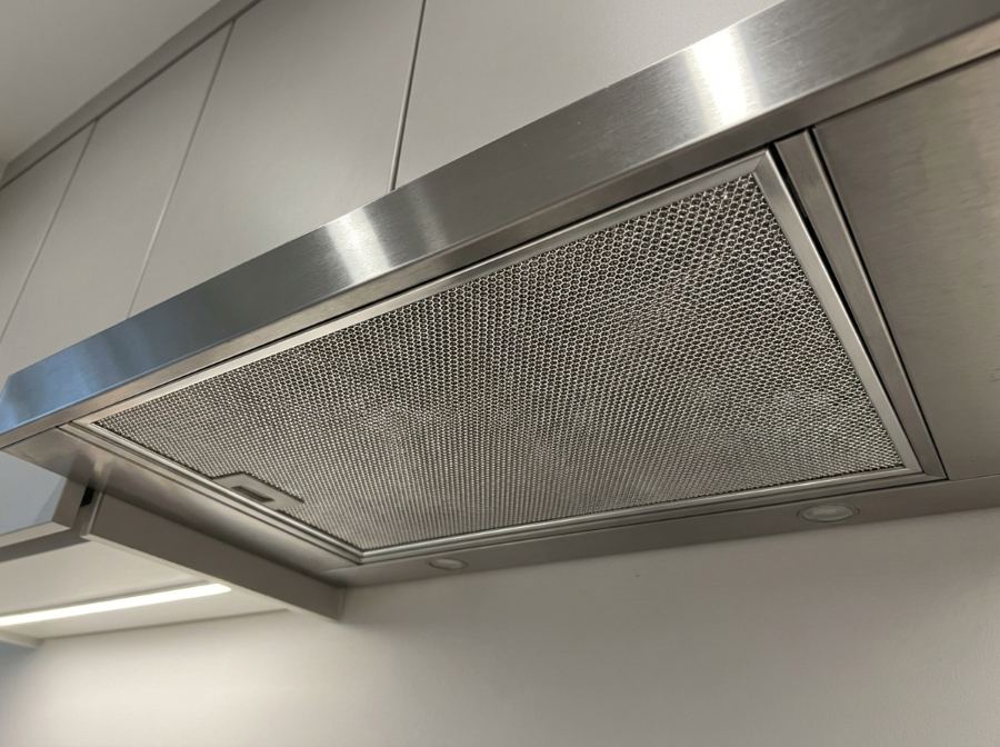 Clean stainless range hood filter in a Hampton Roads kitchen